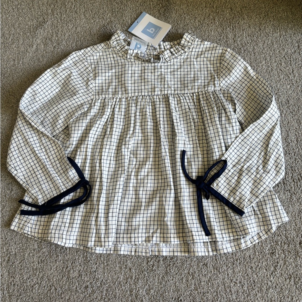 Bella Bliss navy/white blouse with ties at wrist. NWT, size 7